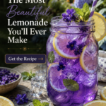 Refreshing butterfly pea flower lemonade served in a mason jar with lemon slices.