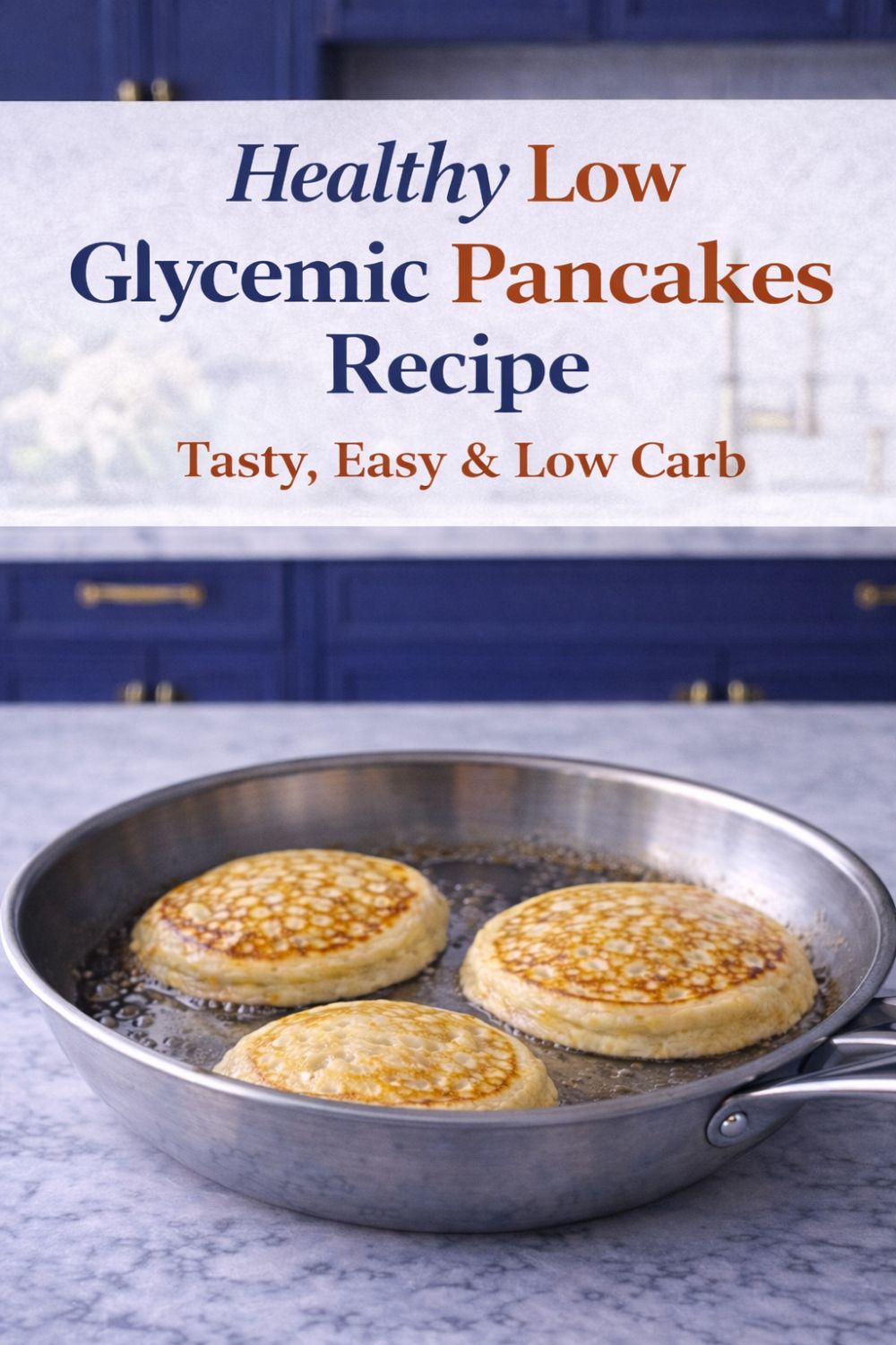 Low glycemic pancakes cooking in a stainless steel pan with golden tops on a marble countertop