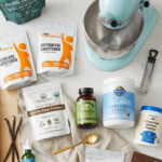 Measured ingredients for sugar-free marshmallows arranged on a kitchen counter with mixing tools and thermometer.