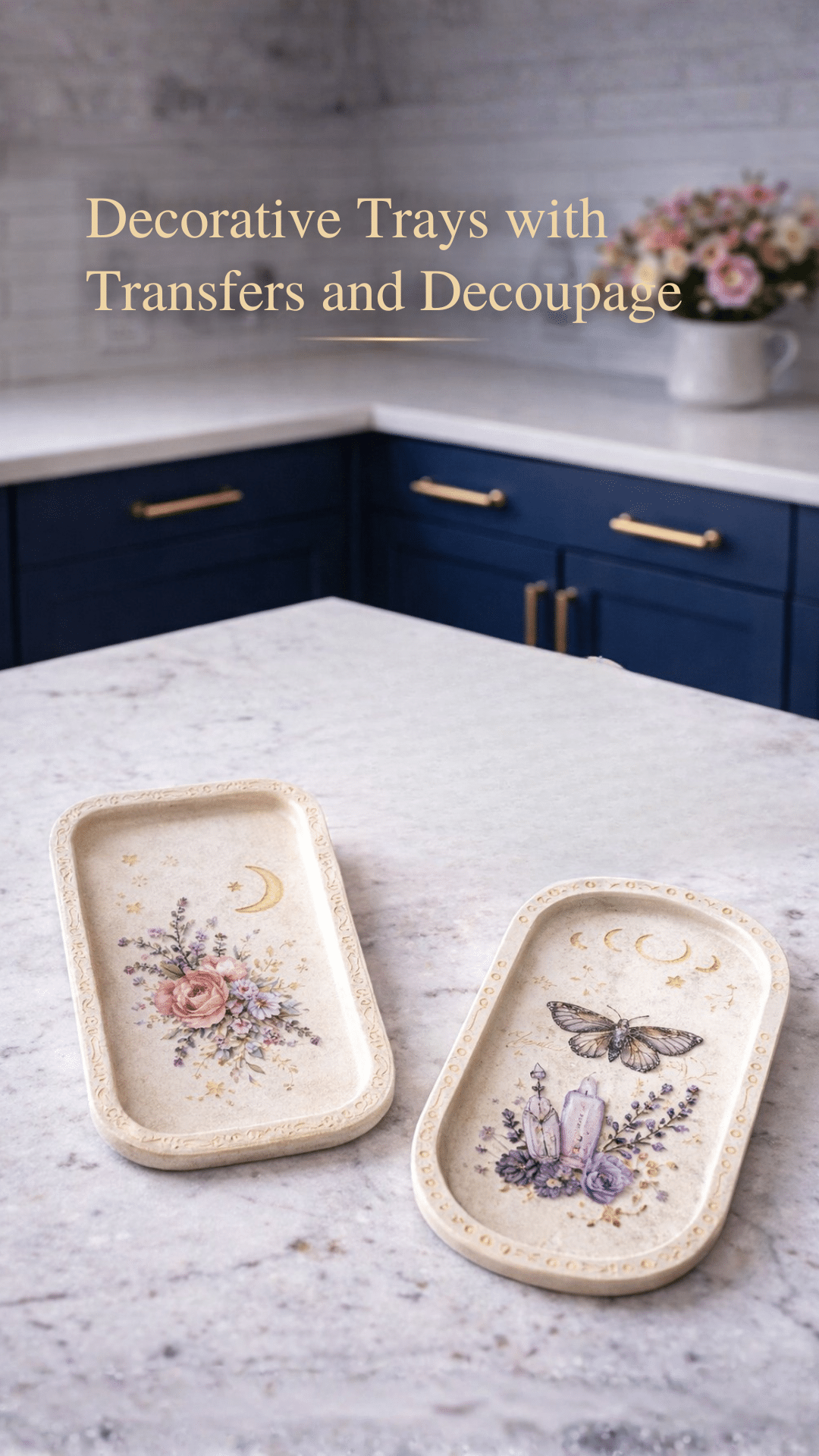 Two decorative clay trays with floral and botanical transfer art styled on a white quartz countertop in a bright blue kitchen.