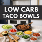 Lazy dinner low carb taco bowls with cooked taco meat in a skillet and bowls of lettuce, tomatoes, avocado, cheese, sour cream, and salsa on a kitchen counter.