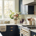 Rustic kitchen wall with hanging bundles of herbs and shelves filled with glass jars of dried herbs in a cottage witch kitchen.
