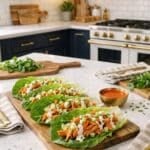 low carb buffalo chicken wraps - romaine lettuce is the wrap in a beautiful kitchen