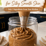 Pinterest pin with text reading DIY Brown Sugar Scrub for Silky Smooth Skin — Only 3 Ingredients From Your Kitchen over a photo of whipped scrub being piped into a clear jar on a marble countertop