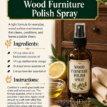 Amber glass spray bottle labeled Wood Furniture Polish Spray beside a bowl of olive oil, sliced lemon, and fresh lavender sprigs in front of a dark wood dresser. Room-by-room essential oil cleaning spray recipes by Aligned Design.