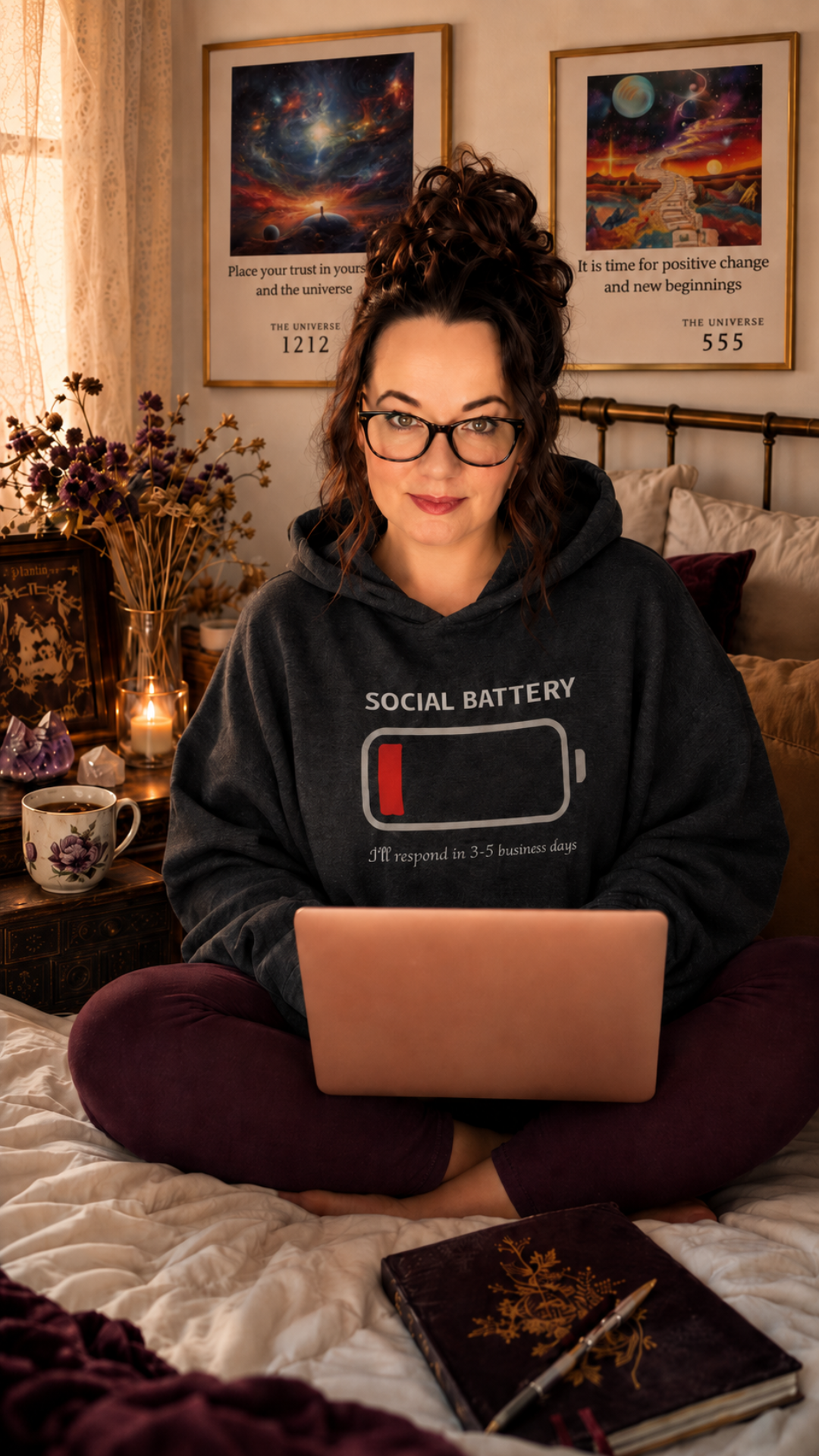 Woman working on laptop in a cozy moody home workspace surrounded by candles and books representing flexible online income for chronic illness