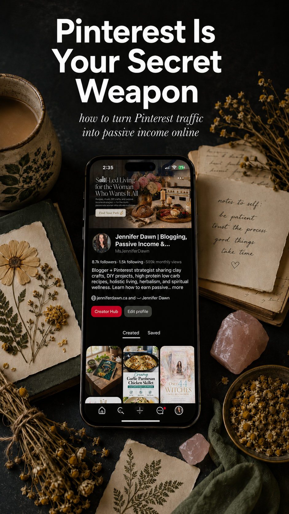 Smartphone displaying Jennifer Dawn's Pinterest profile with 589k monthly views surrounded by dried botanicals, rose quartz crystals, and a handwritten content plan representing how to turn Pinterest traffic into passive income online