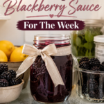 A large mason jar of homemade blackberry sauce tied with a ribbon in the refrigerator, surrounded by fresh blackberries, lemons, and jars of pantry staples. Text overlay reads Meal Prep This Blackberry Sauce For The Week.