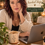 Woman with dark red hair in a cream cardigan resting her chin on her hand at a warm home office desk with laptop, coffee mug and candles, with text overlay reading "AI is why I still have a business on my hardest days."