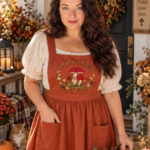Rust linen pinafore apron dress with embroidered mushrooms for cottagecore mushroomcore outfits