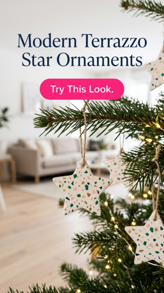 Cream polymer clay star ornaments with terrazzo chips in green, pink, gold, and navy, hanging from twine on a Christmas tree in a bright Scandinavian living room.