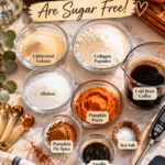 Labeled glass bowls of ingredients for sugar-free pumpkin spice marshmallows on a marble counter: unflavored gelatin, collagen peptides, allulose, pumpkin puree, pumpkin pie spice, cold brew coffee, vanilla bean paste and sea salt, with gold measuring spoons, a digital thermometer, a spatula, cinnamon sticks and an orange pumpkin.